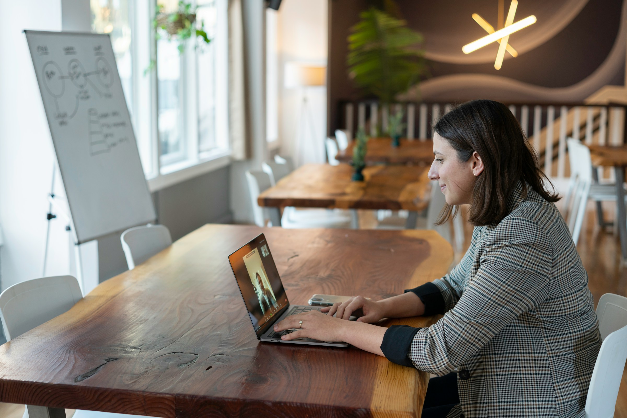 person in a meeting - How to Be Productive