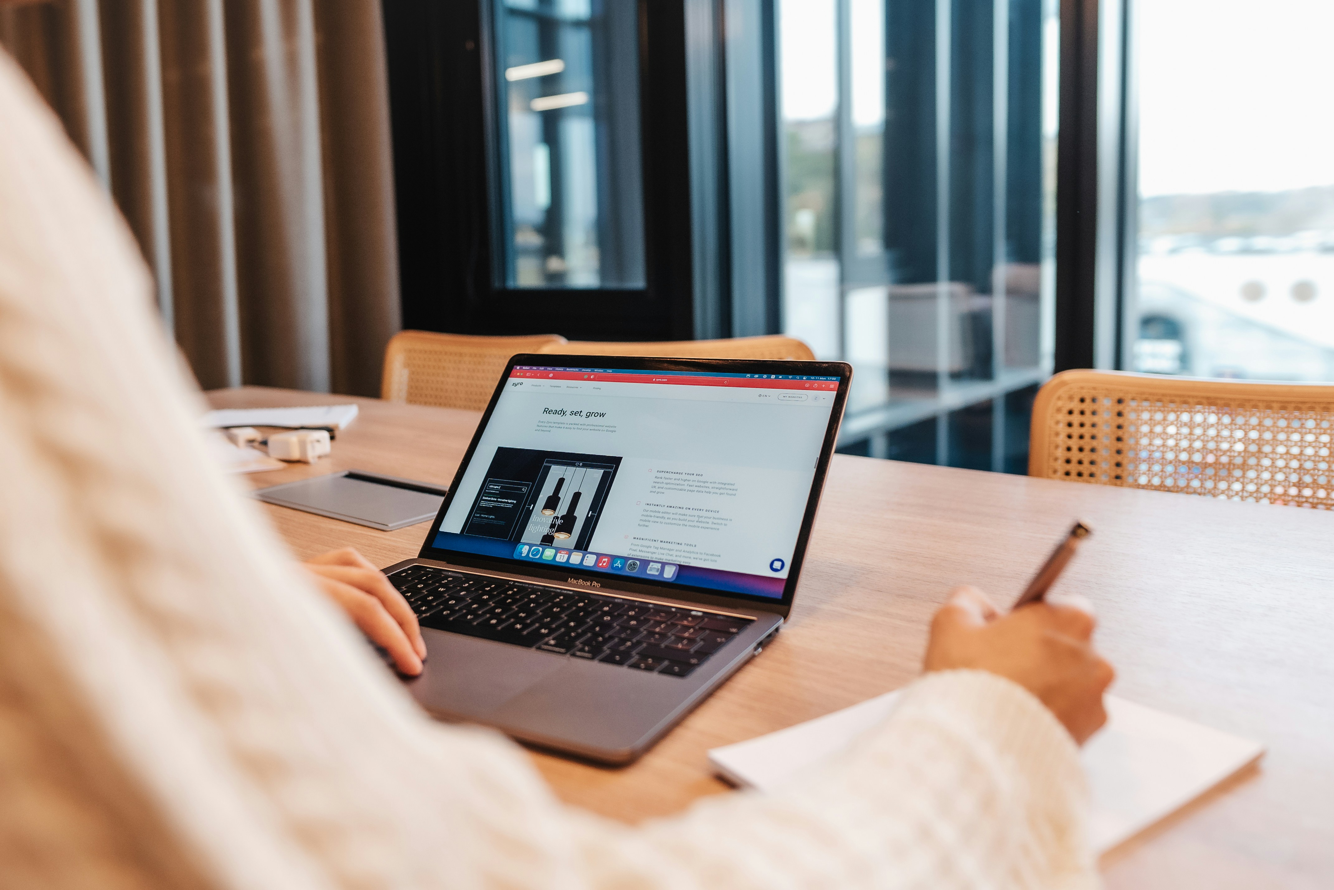 person using laptop - AI Description Writer