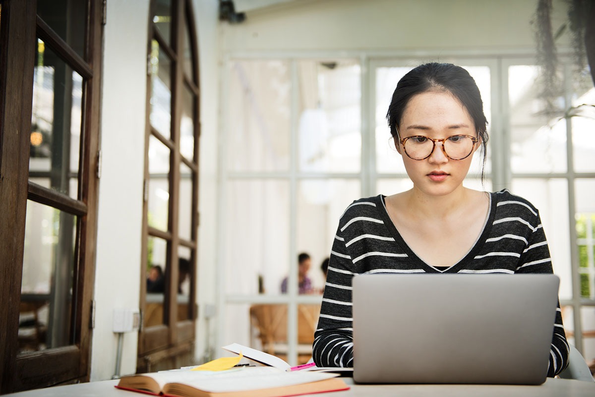 woman finding tools - Medallia Alternatives