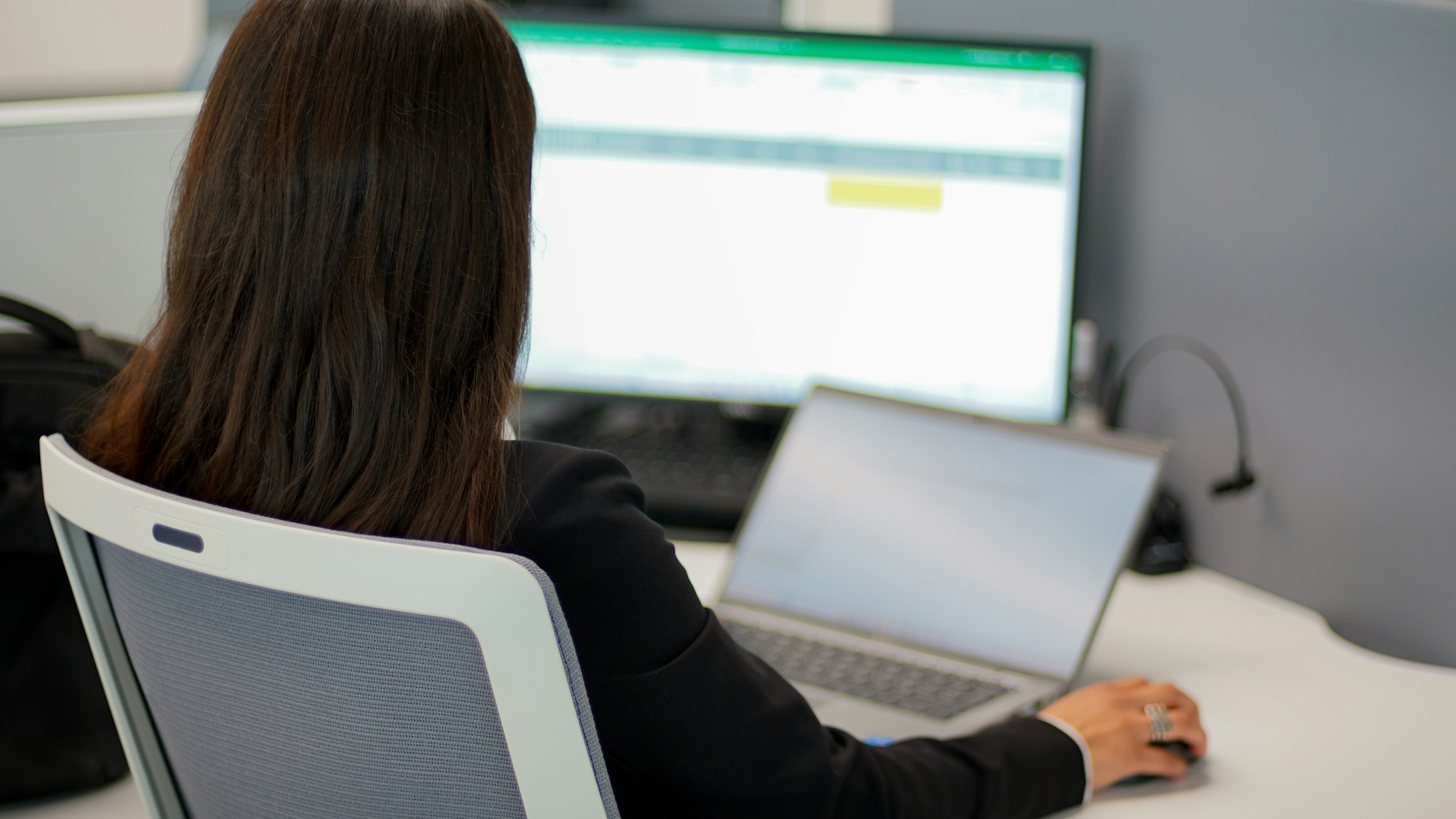 woman arranging doc - How to Count Words in Google Sheets