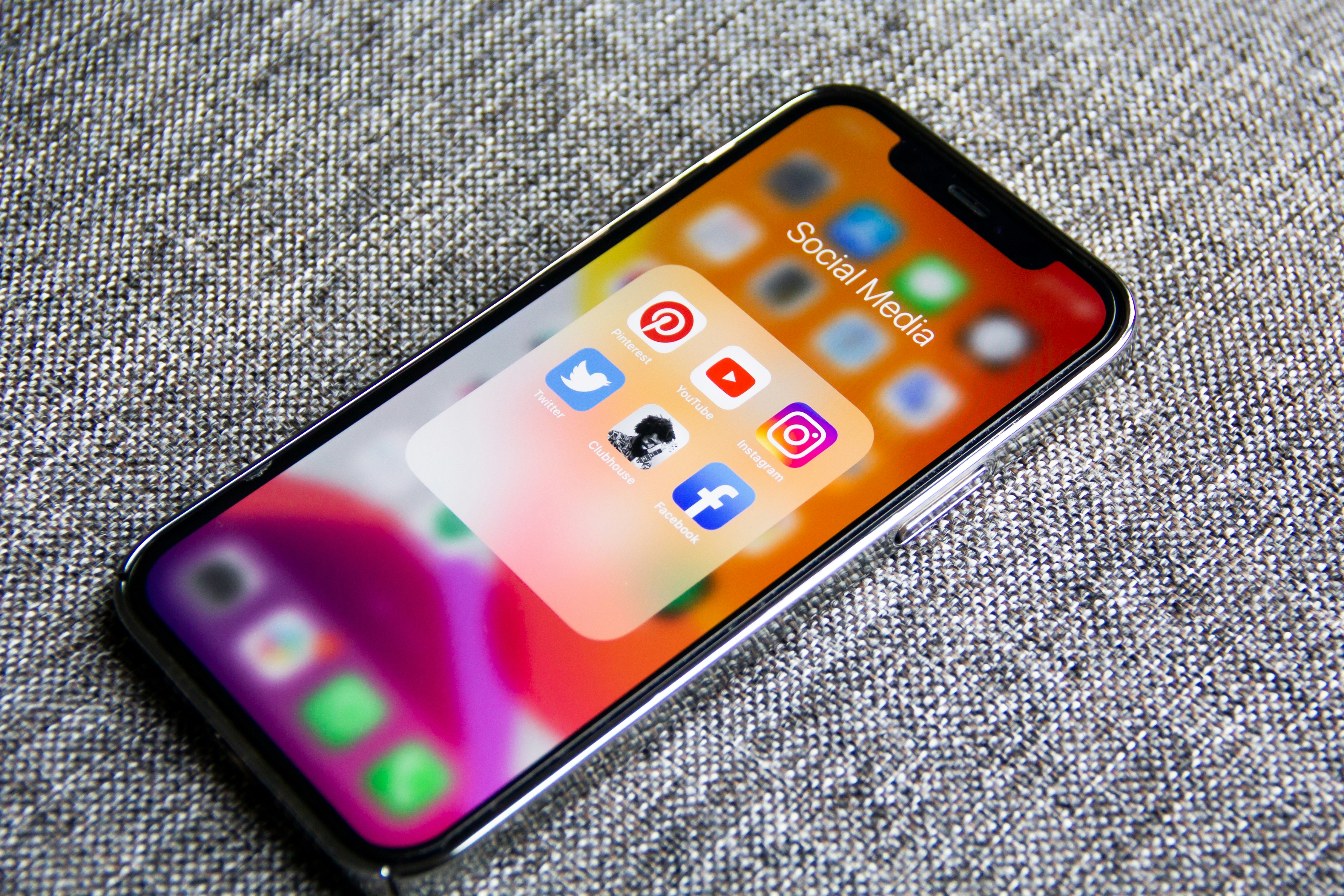 iphone with social media apps - social media prompts