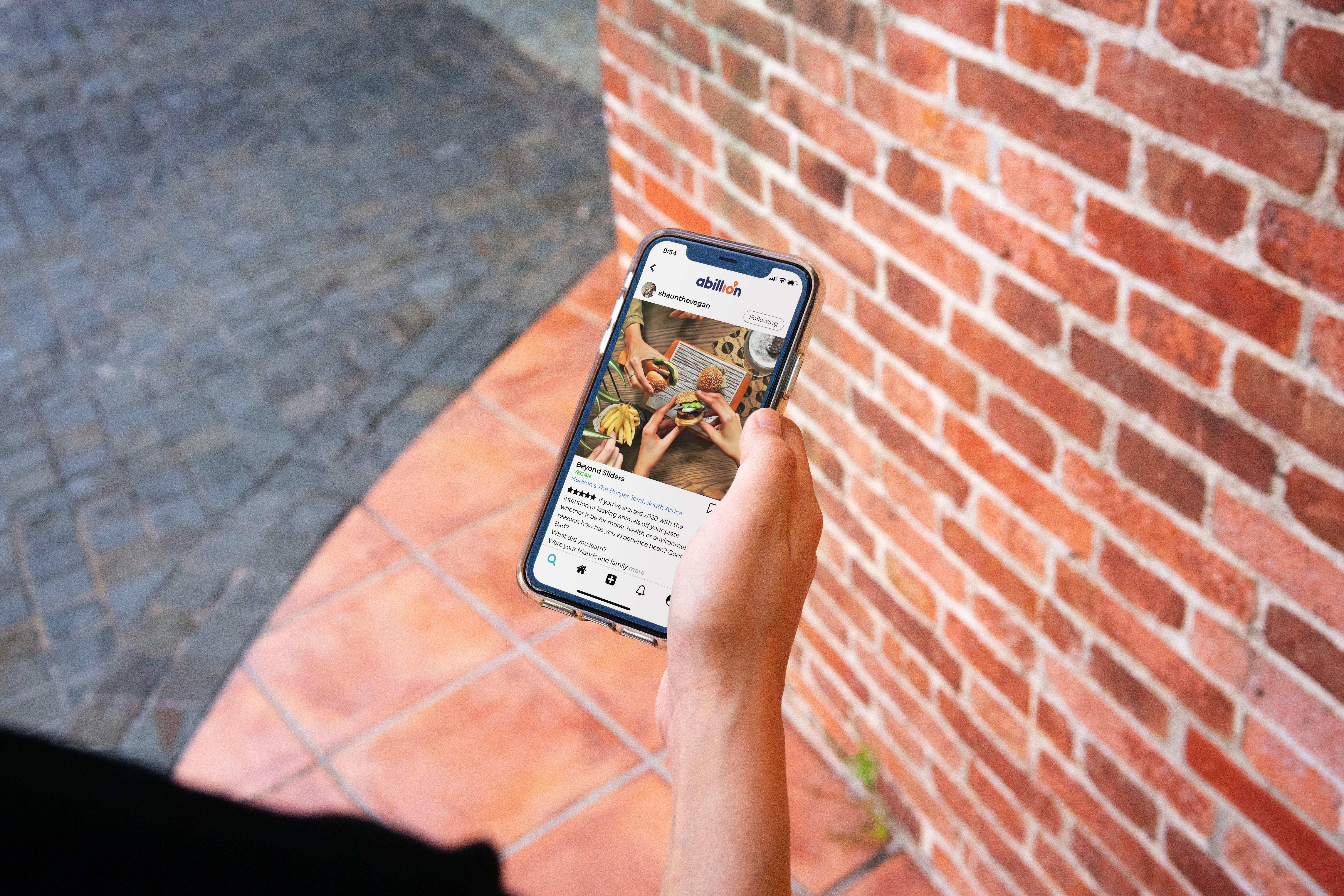 man looking at reviews on his phone - sentiment analysis of reviews