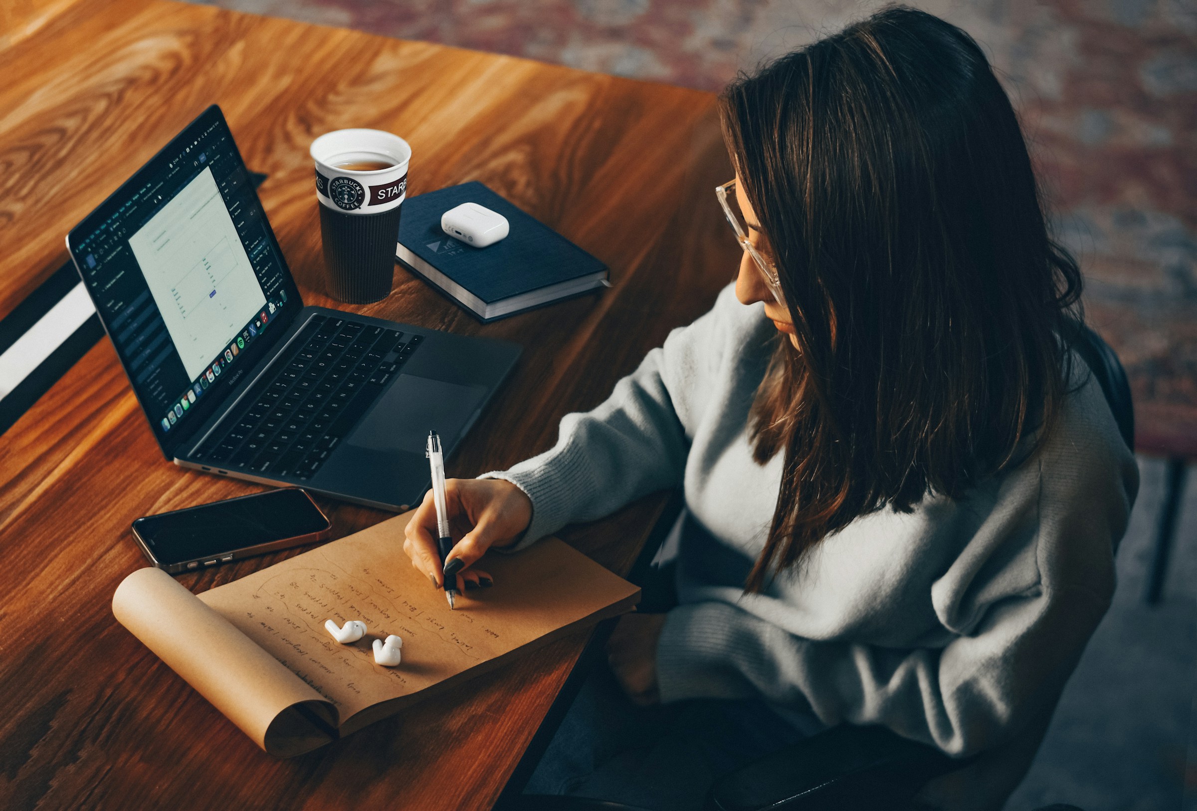 woman making notes - Summarize Written Text