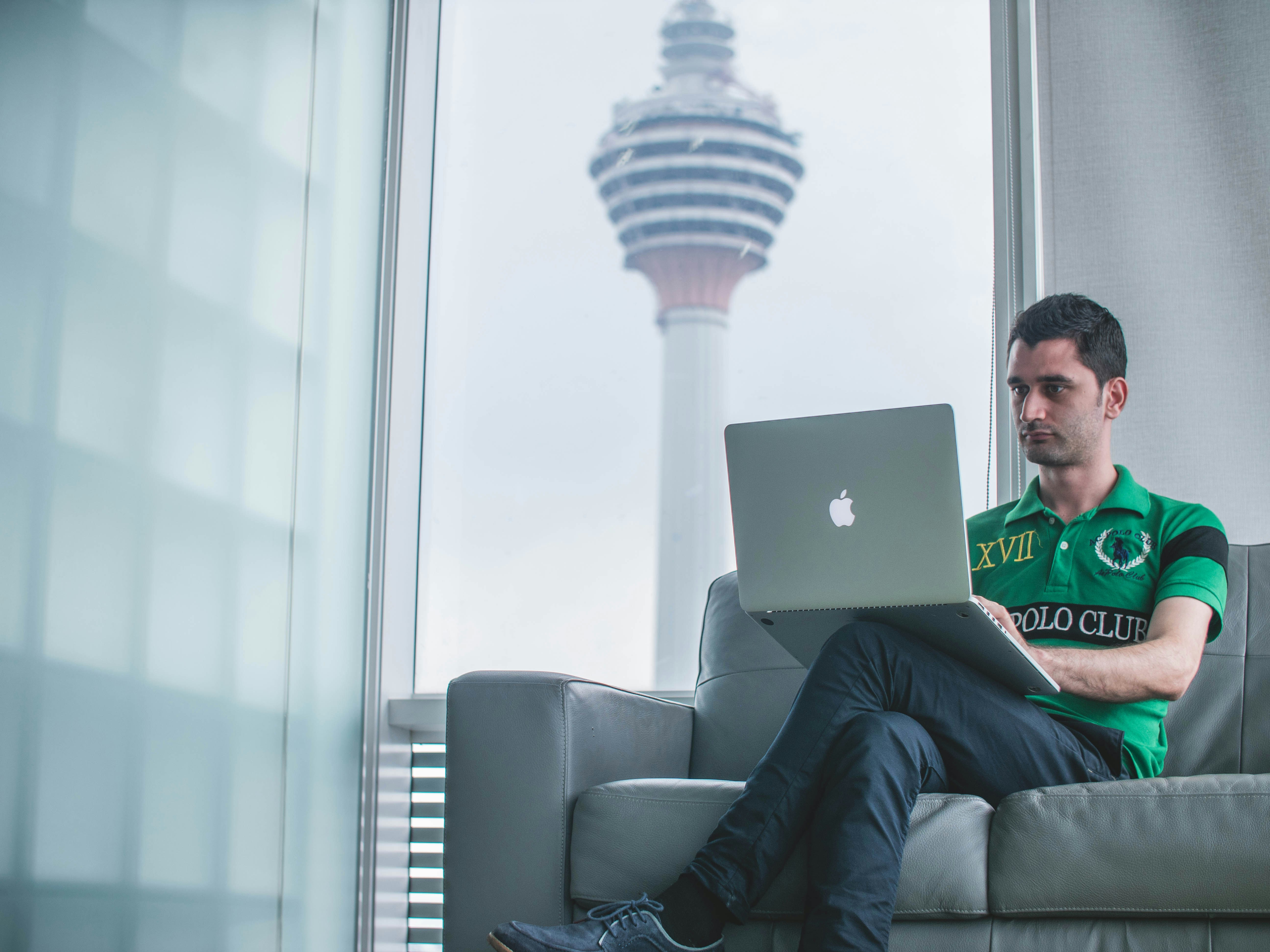 person on his couch learning How To Create A Workflow In Excel