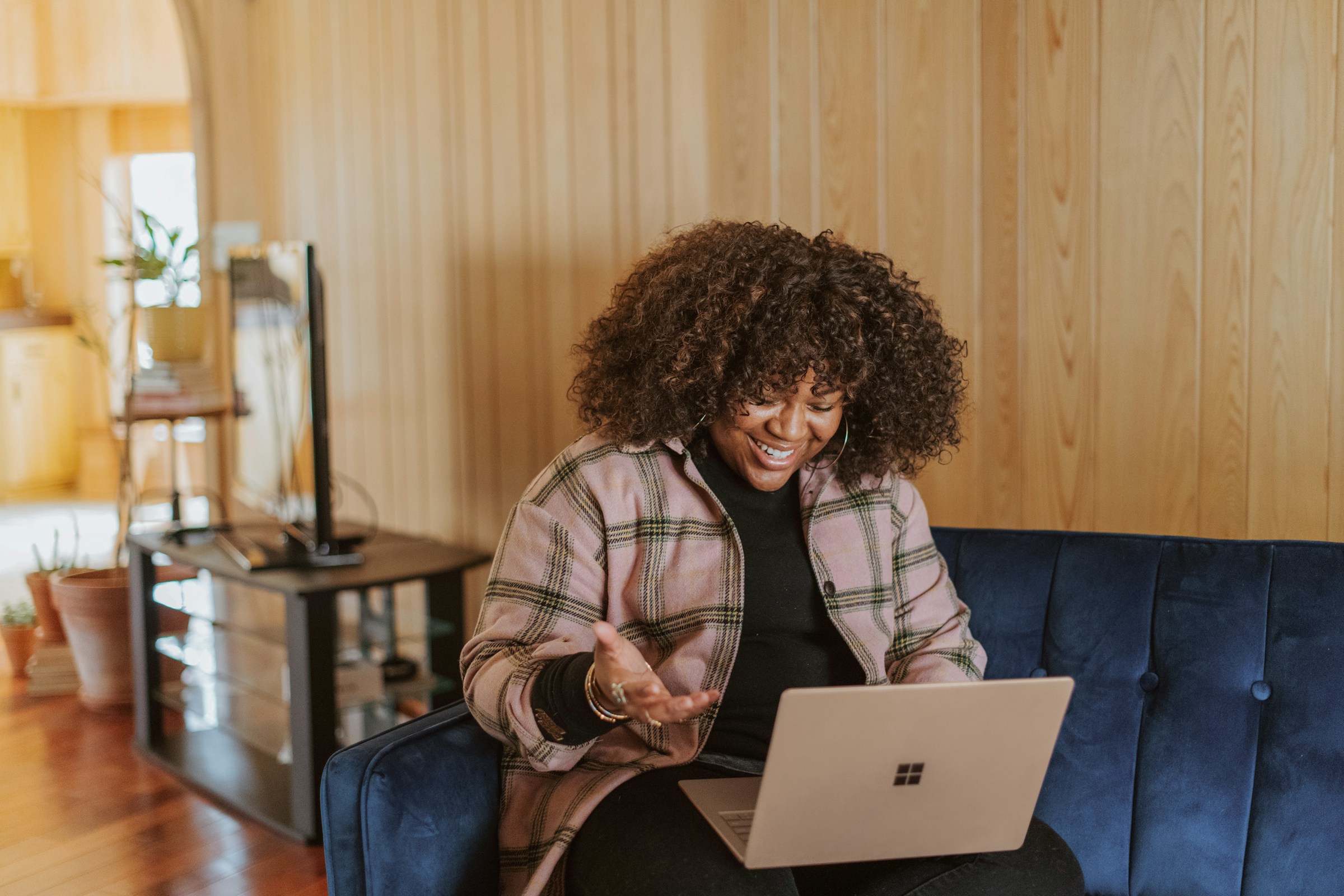 woman trying out new features - How to AutoSum in Google Sheets