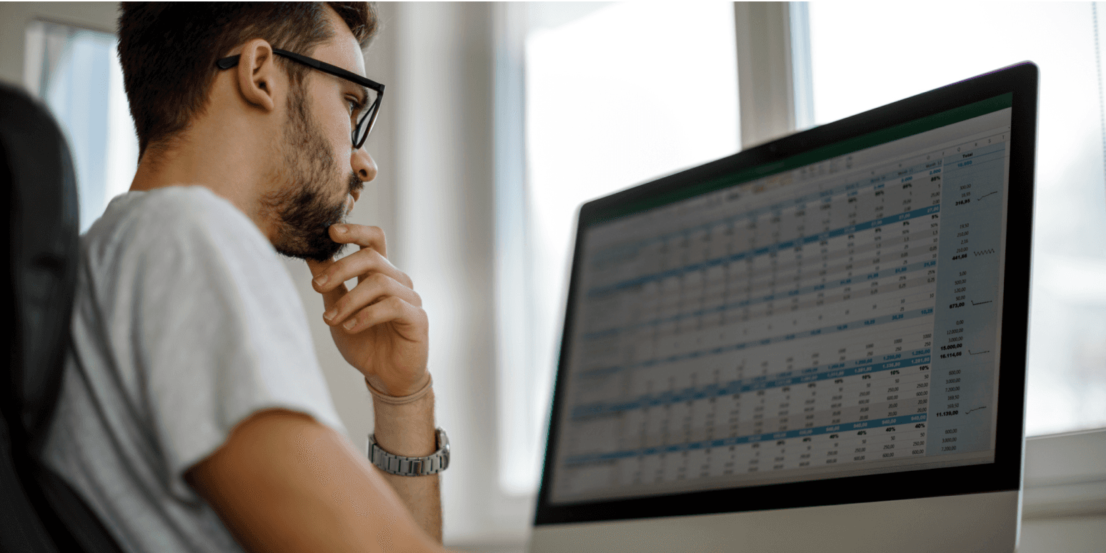 man using computer - MonkeyLearn Alternatives